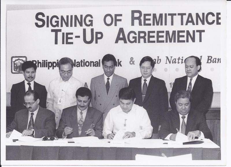 CEO sign up remittance agreement with PNB on behalf of ANB in Manila 1993